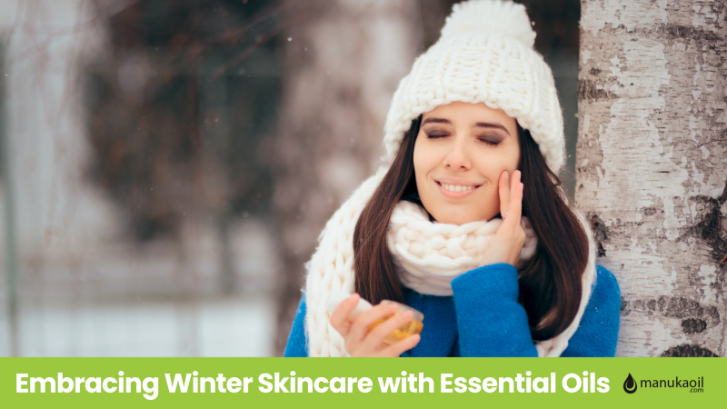 woman in white beanie and scarf enjoying winter snow with winter skincare Embracing Winter Skincare with Essential Oils www.ManukaOil.com