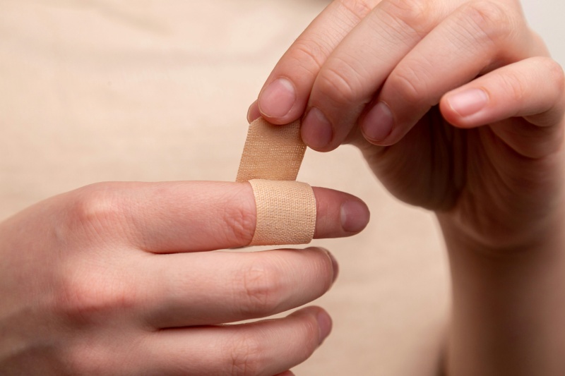 The man seals the wound with adhesive plaster The medicine Wound Infection First aid